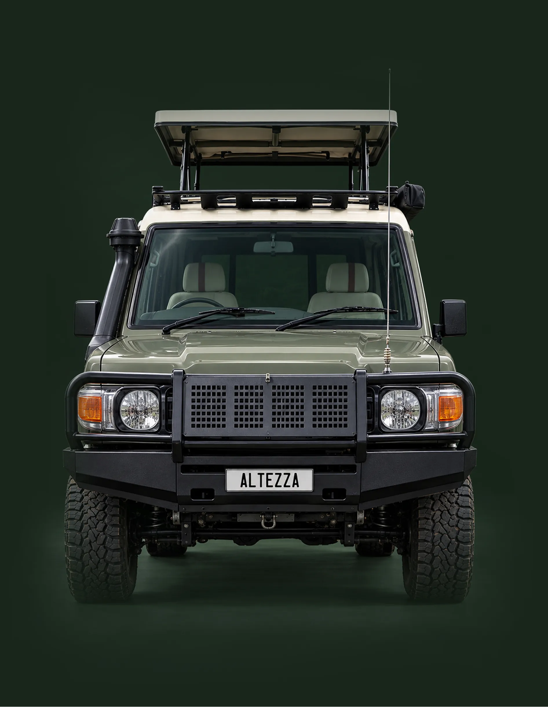 Front view of an Altezza safari Land Cruiser with its roof raised