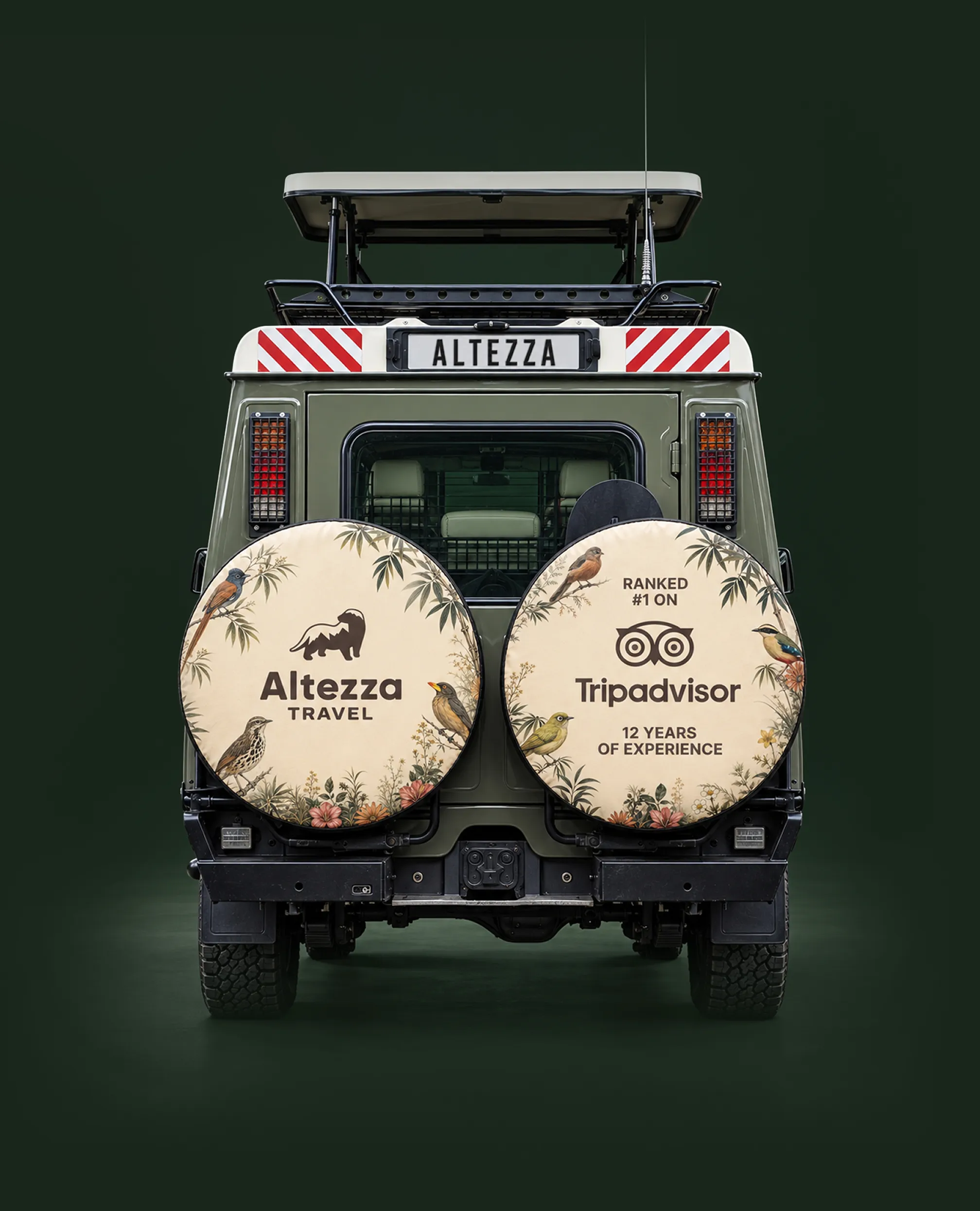 Rear view of an Altezza safari Land Cruiser with its panoramic roof raised